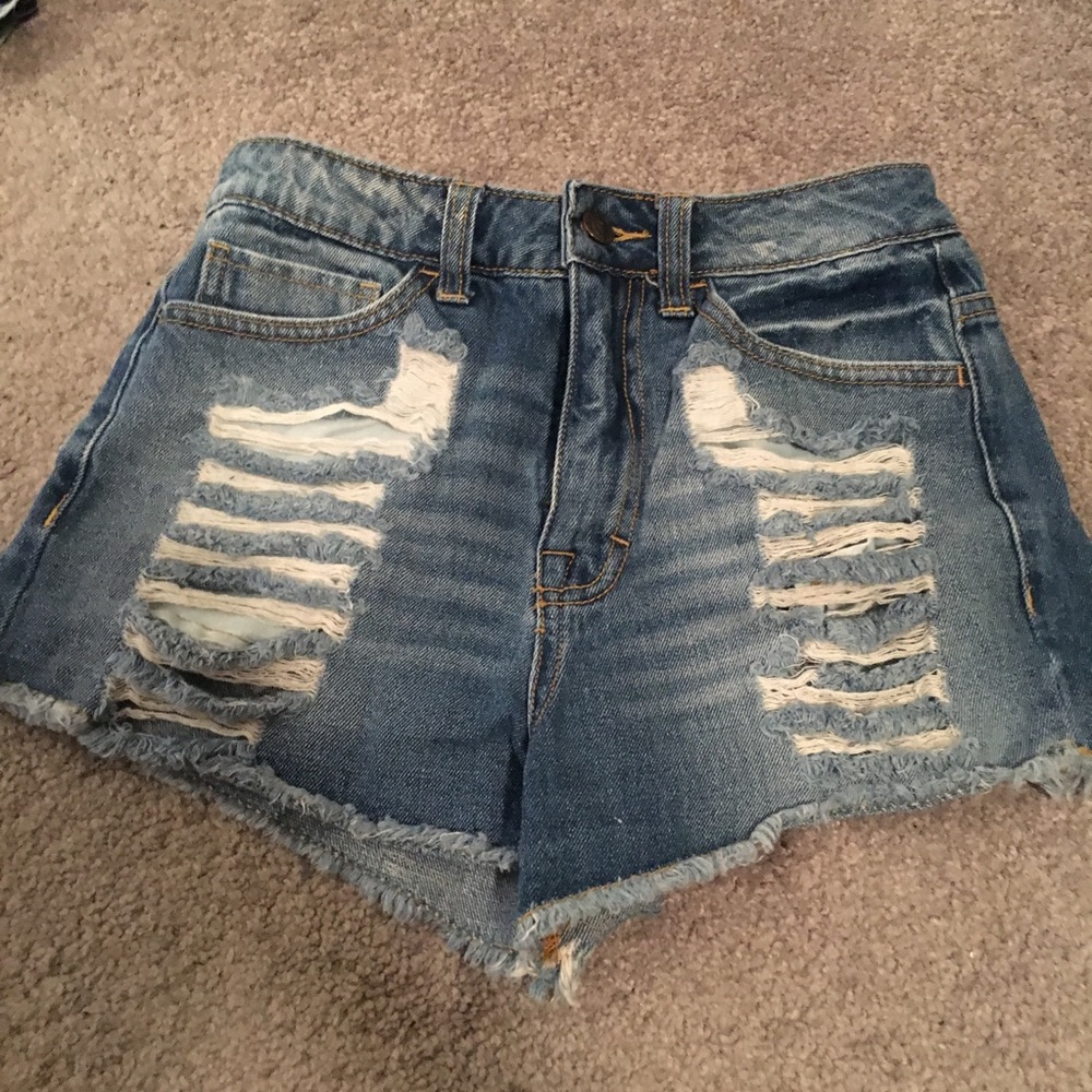 Blue ripped jean shorts